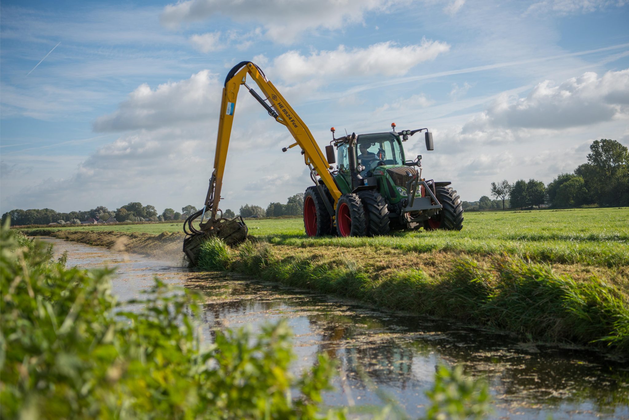 Tractor hoogwerkers aan het werk